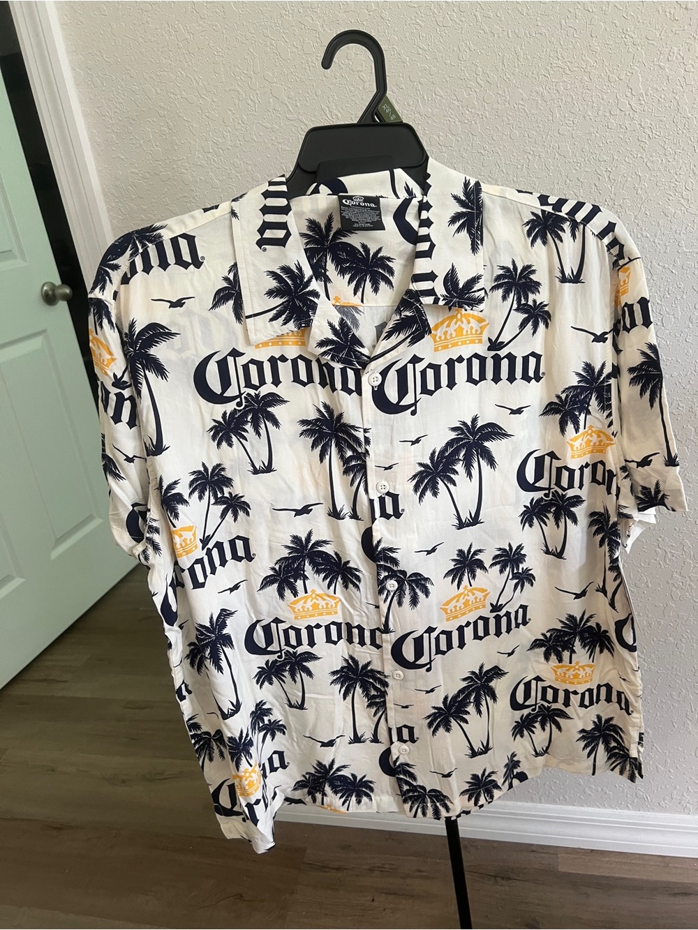 Corona White Short Sleeve Shirt with Navy Palm Print and Gold Crown Accents